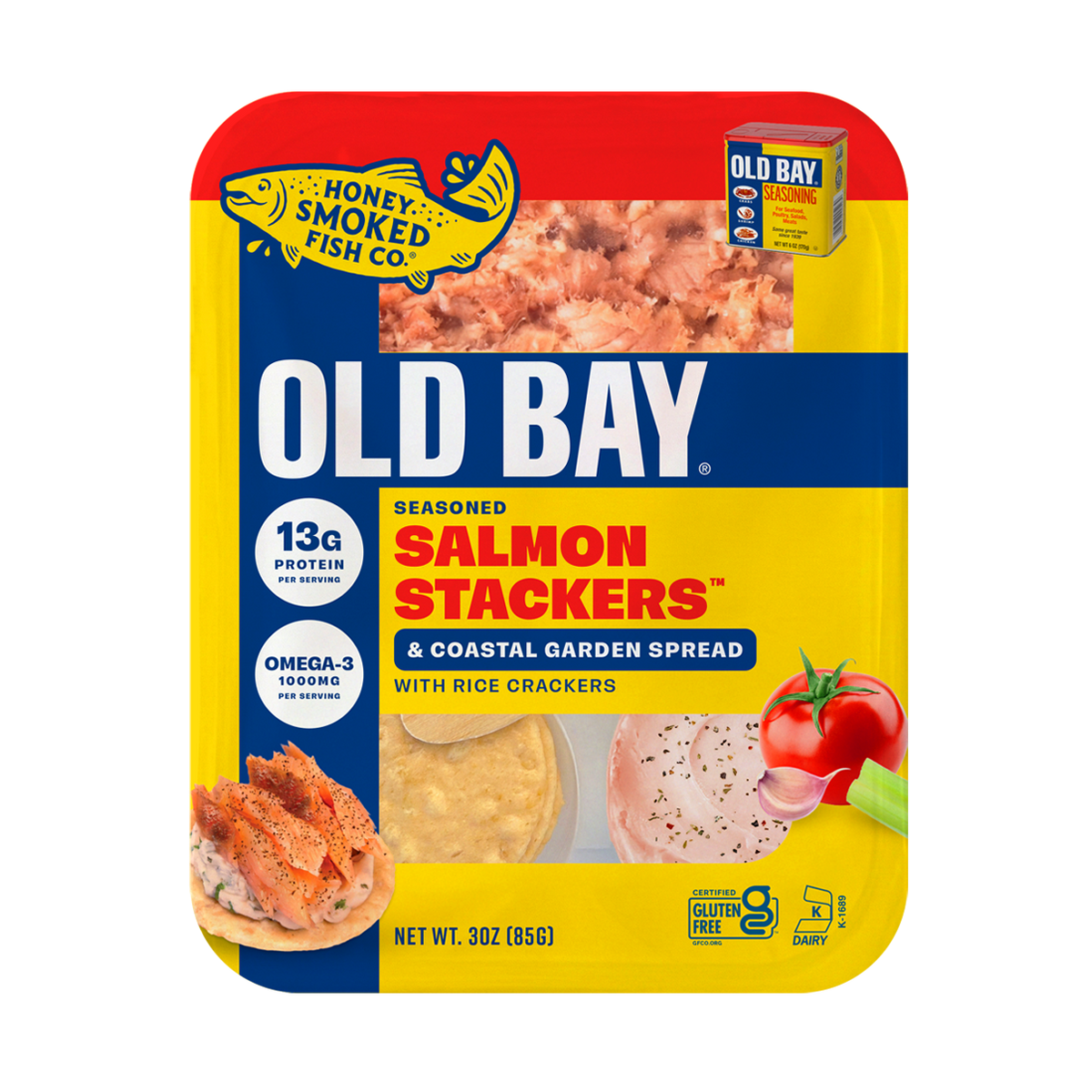 A 3 oz package of Old Bay Seasoned Salmon Stackers & Coastal Garden Spread with rice crackers, featuring a red, yellow, and blue design with food imagery and product details.